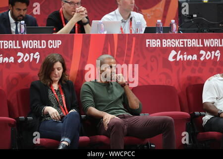 Beijing, China. 15th Sep, 2019. Tony Parker (front R), former French basketball player, looks on during the third place game between France and Australia at the 2019 FIBA World Cup in Beijing, capital of China, Sept. 15, 2019. Credit: Meng Yongmin/Xinhua/Alamy Live News Stock Photo