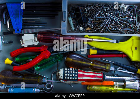 Closeup tools various in opened toolbox. View from above. High resolution image gallery. Stock Photo