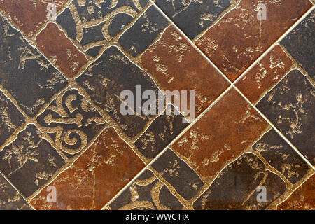 Brown ceramic tiles with an abstract pattern. Stock Photo