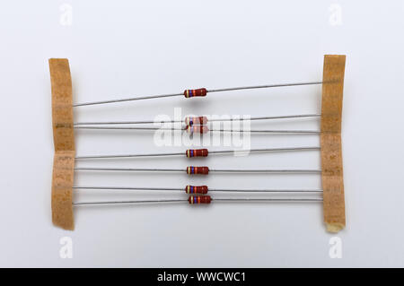 Thru hole mounting resistors on a white background Stock Photo