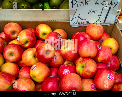 Class 1 Pink Lady eating apples in a greengrocers shop in North Yorkshire priced at 4 for £1 September 2019 Stock Photo