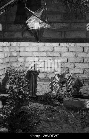 Rustic Christmas Cribs on display in Goa India Stock Photo