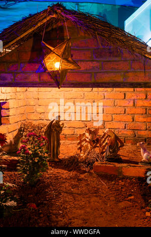 Rustic Christmas Cribs on display in Goa India Stock Photo