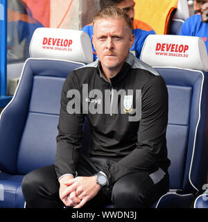 15th September 2019; The John Smiths Stadium, Huddersfield, Yorkshire, England; English Championship Football, Huddersfield Town Football Club versus Sheffield Wednesday; Sheffield Wednesday Manager Garry Monk, takes his seat prior to the game - Strictly Editorial Use Only. No use with unauthorized audio, video, data, fixture lists, club/league logos or 'live' services. Online in-match use limited to 120 images, no video emulation. No use in betting, games or single club/league/player publications Stock Photo