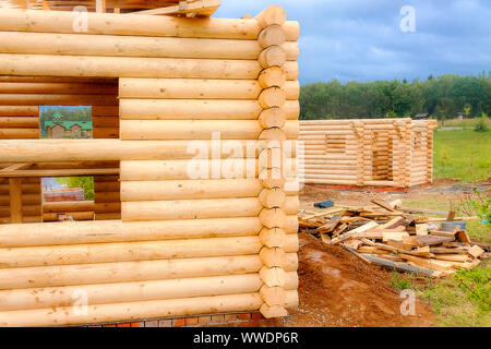 The corner of a newly built wooden house. Stock Photo