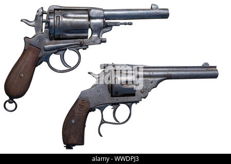 Two antique revolvers. Ancient weapon. Stock Photo