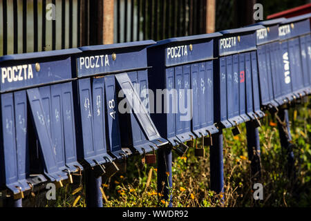 blue letterboxes with numbers and locks Stock Photo
