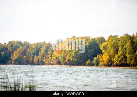 Photo of autumn trees, river by day Stock Photo