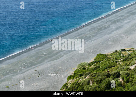 Long black beach in Nonza, Cape Corse, Corsica, France. Landscape in Nonza Beach, located on the West Coast of Cap Corse. Stock Photo