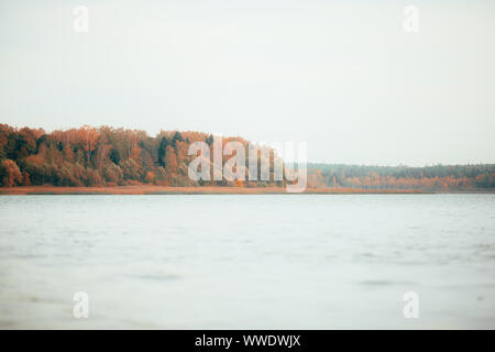 Photo of autumn trees, river by day Stock Photo