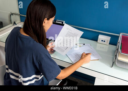 Architect woman working on some blueprints Stock Photo