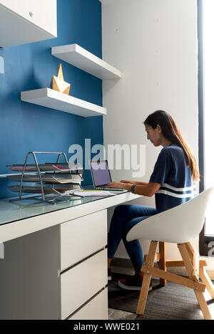 Architect woman working on some blueprints Stock Photo