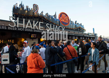 Queens, New York, USA. 13th Sep, 2019. Fans wait in line at Shake Shack during the game between The New York Mets and The Los Angeles Dodgers at Citi Field in Queens, New York. Mandatory credit: Kostas Lymperopoulos/CSM/Alamy Live News