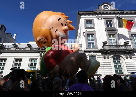 Brussels, Belgium. 15th Sep, 2019. People attend the Balloon's Day Parade of the 2019 Brussels Comic Strip Festival in Brussels, Belgium, Sept. 15, 2019. The Balloon's Day Parade is a traditional show during each year's comic festival. Credit: Zheng Huansong/Xinhua/Alamy Live News Stock Photo