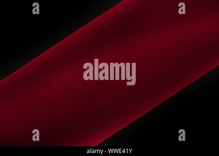 Two color red and black luxury background or concept, folds of red and black fabric Stock Photo