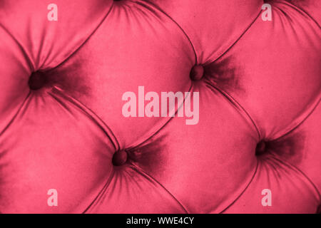 Furniture design, classic interior and royal vintage material concept - Pink luxury velour quilted sofa upholstery with buttons, elegant home decor te Stock Photo