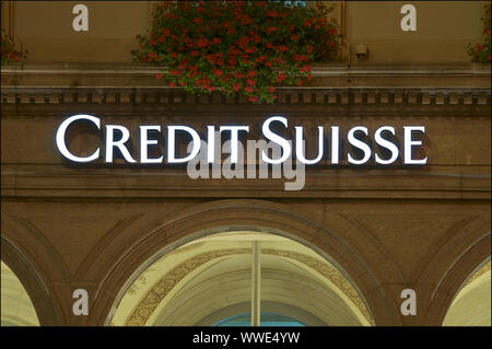 Lugano, Ticino, Switzerland - 17th August 2019 : Front view of the Credit Suisse Bank logo hanging in front of the building in the city of Lugano, Swi