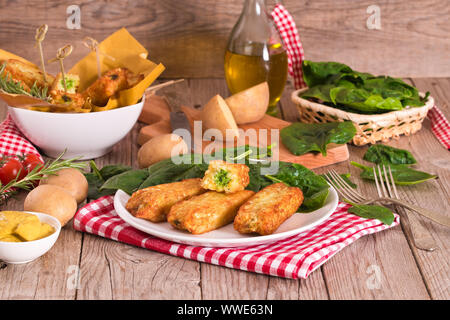 Potato croquettes with spinach and mozzarella. Stock Photo