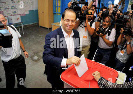 Marsa city, Tunis. 15th Sep, 2019. Youssef Chahid prime Minister condidates to the 2019 presidential elections at the polling station at the Abderrahmen Mami school at the Marsa City in Tunis during the first round of the presidential election in Tunisia this Sunday, September 15th. Credit: Chokri Mahjoub/ZUMA Wire/Alamy Live News Stock Photo