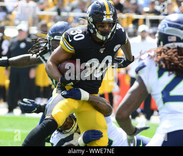 Pittsbugh, United States. 15th Sep, 2019. Seattle Seahawks stops Pittsburgh Steelers running back James Conner (30) for no gain at the end of the first quarter at Heinz Field in Pittsburgh on Sunday, Sept 15, 2019. Photo by Archie Carpenter/UPI Credit: UPI/Alamy Live News Stock Photo