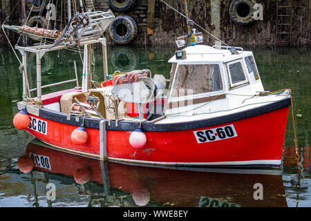 Colourful Pleasure Boats, Fishing Boats and Trawlers in Looe, Polperro and Mevaggisey Harbours .Cornwall UK Stock Photo