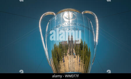 A huge installation of the UEFA Championship League trophy is located in front of the Royal Palace at Oriente Square downtown Madrid, Spain Stock Photo