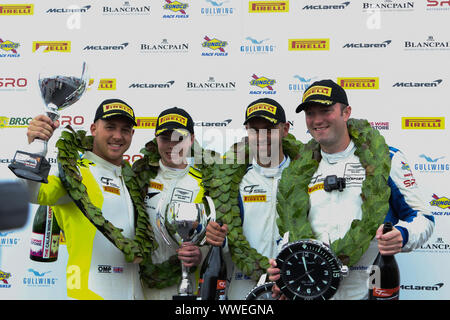 Derby, UK. 15th Sep, 2019. 2019 British GT champions from left to right, GT4 champions TF Sport drivers Ashley Hand & Tom Canning and GT3 champions TF Sport drivers Jonny Adam & Graham Davidson during the British GT Donington Park GP at Donington Park, Derby, England on 15 September 2019. Photo by Jurek Biegus. Editorial use only, license required for commercial use. No use in betting, games or a single club/league/player publications. Credit: UK Sports Pics Ltd/Alamy Live News Stock Photo