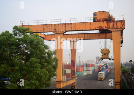 Huge sized liver for lifting container in dockyard of komolapur railway station Stock Photo