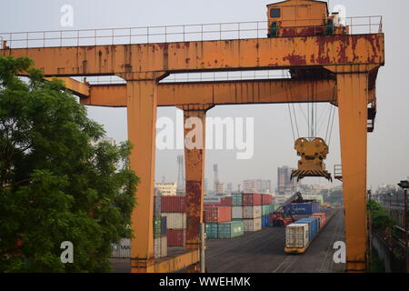 Huge sized liver for lifting container in dockyard of komolapur railway station Stock Photo