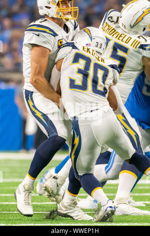 DETROIT, MI - SEPTEMBER 15: Los Angeles Chargers QB Philip Rivers (17) collides with Los Angeles Chargers RB Austin Ekeler (30) during a handoff in the NFL game between Los Angeles Chargers and Detroit Lions on September 15, 2019 at Ford Field in Detroit, MI (Photo by Allan Dranberg/CSM) Stock Photo