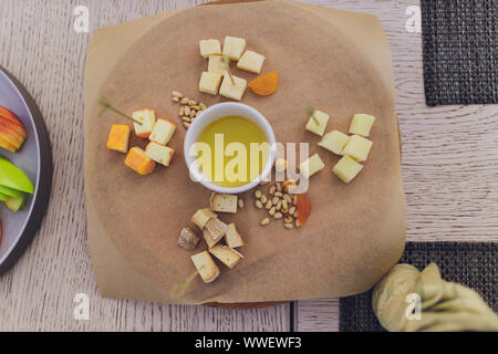 spanish tapas and sangria on wooden table, top view Stock Photo