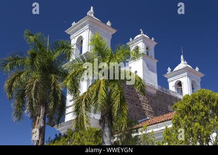 Back View of Iglesia Santa Lucia, a Colonial White Cathedral on Main Plaza in Central American Town Suchitoto, El Salvador Stock Photo