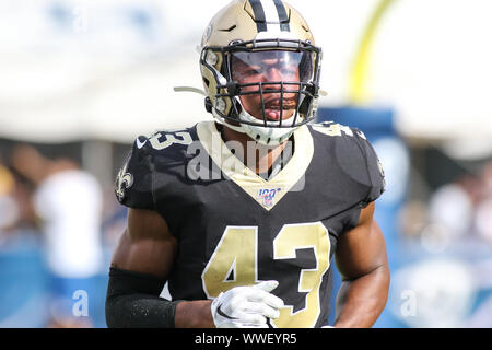 New Orleans Saints free safety Pierre Warren (42) returns an interception  for 33 yards that was thrown by New England Patriots quarterback Jimmy  Garoppolo during the fourth quarter at the Mercedes-Benz Superdome