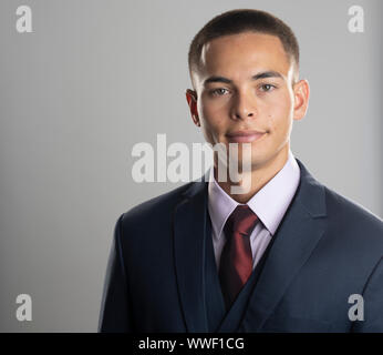 Handsome mixed race young man wearing business suit Stock Photo