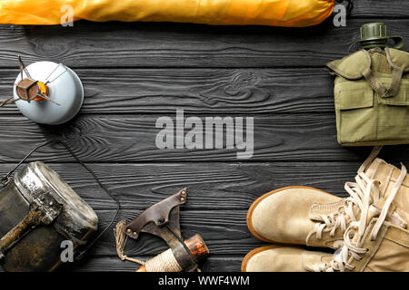 Set of items for camping on wooden background Stock Photo