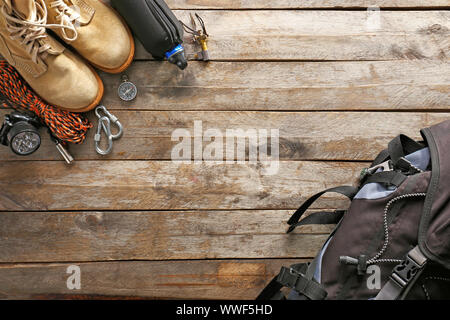 Set of items for camping on wooden background Stock Photo