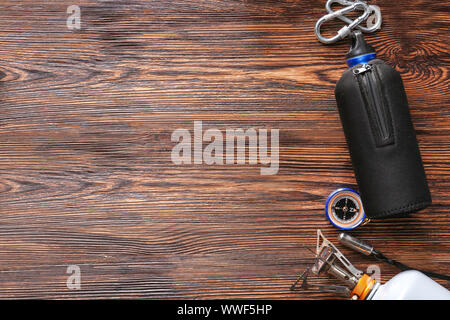 Set of items for camping on wooden background Stock Photo