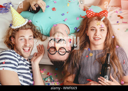 Drunk people after party at home Stock Photo