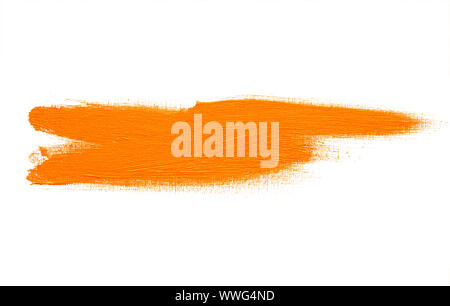 Abstract orange real oil painting brush strokes isolated on white background, painted with orange oil color by hand. Stock Photo