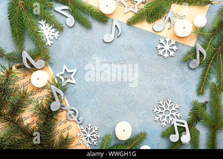 Composition with note sheets, Christmas decor and place for text on grey background Stock Photo