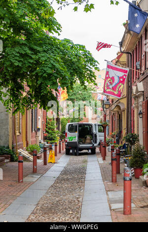 A van delivering plants to Elfreth's Alley ahead of its annual fete celebrating its hertiage as the oldest continually inhabited street in the US Stock Photo