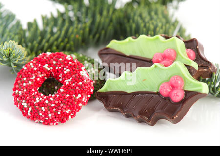 Christmas wreaths and holly from chocolate Stock Photo - Alamy