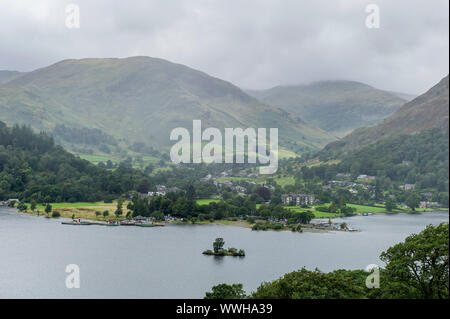 View from path of Ullswater lake between Sandwich and Patterdale East side of lake with Glenridding in the distance. Stock Photo