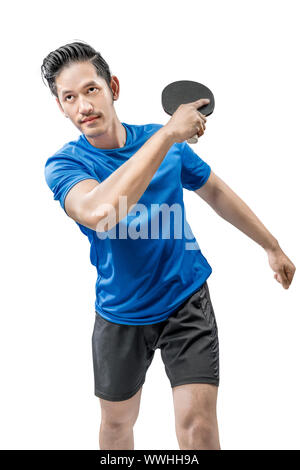 Asian table tennis player swings the racket posing isolated over white background Stock Photo