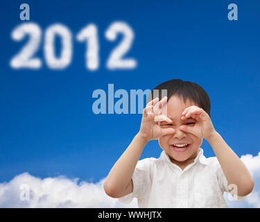 hand of happy kid make telescope shape  and watching the cloud 2012 Stock Photo