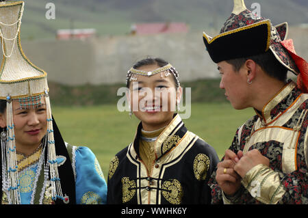 Women and a man in Mongolian costume Stock Photo