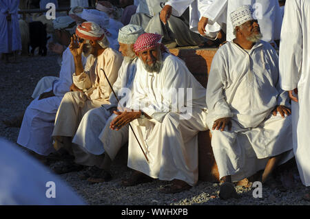 Omani men in the national costume Dishdasha Stock Photo