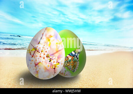 Colorful easter eggs in exotic scenery on sunny beach Stock Photo