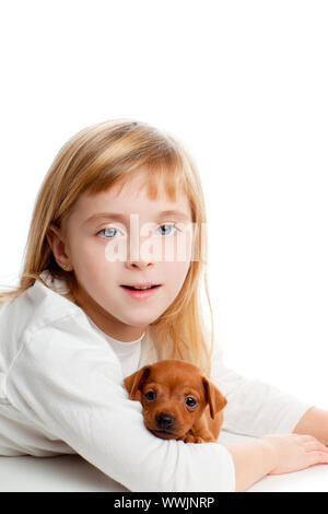 blond kid girl with mini pinscher pet mascot dog on white background ...