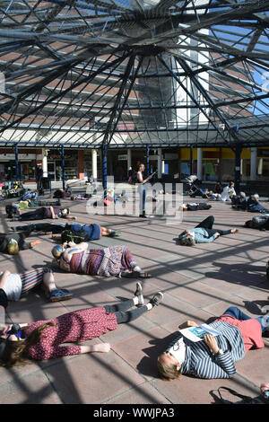 Extinction Rebellion Norwich clean air 'die-in' at Anglia Square to highlight high levels of pollution in parts of the city and promote Car Free Day. Stock Photo